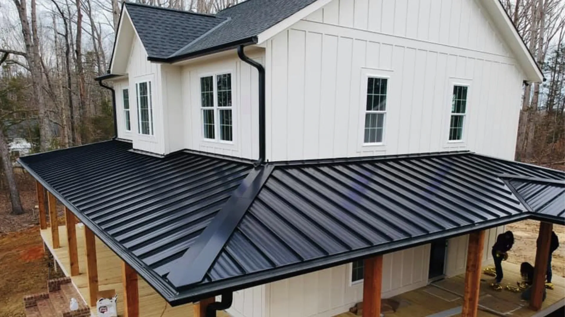 metal roofing companies near me — Coastal Roofing Group licensed crew on residential project
